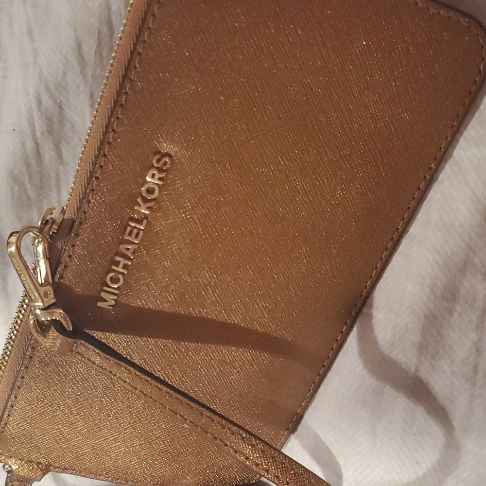 NWOT bronze MK wristlet